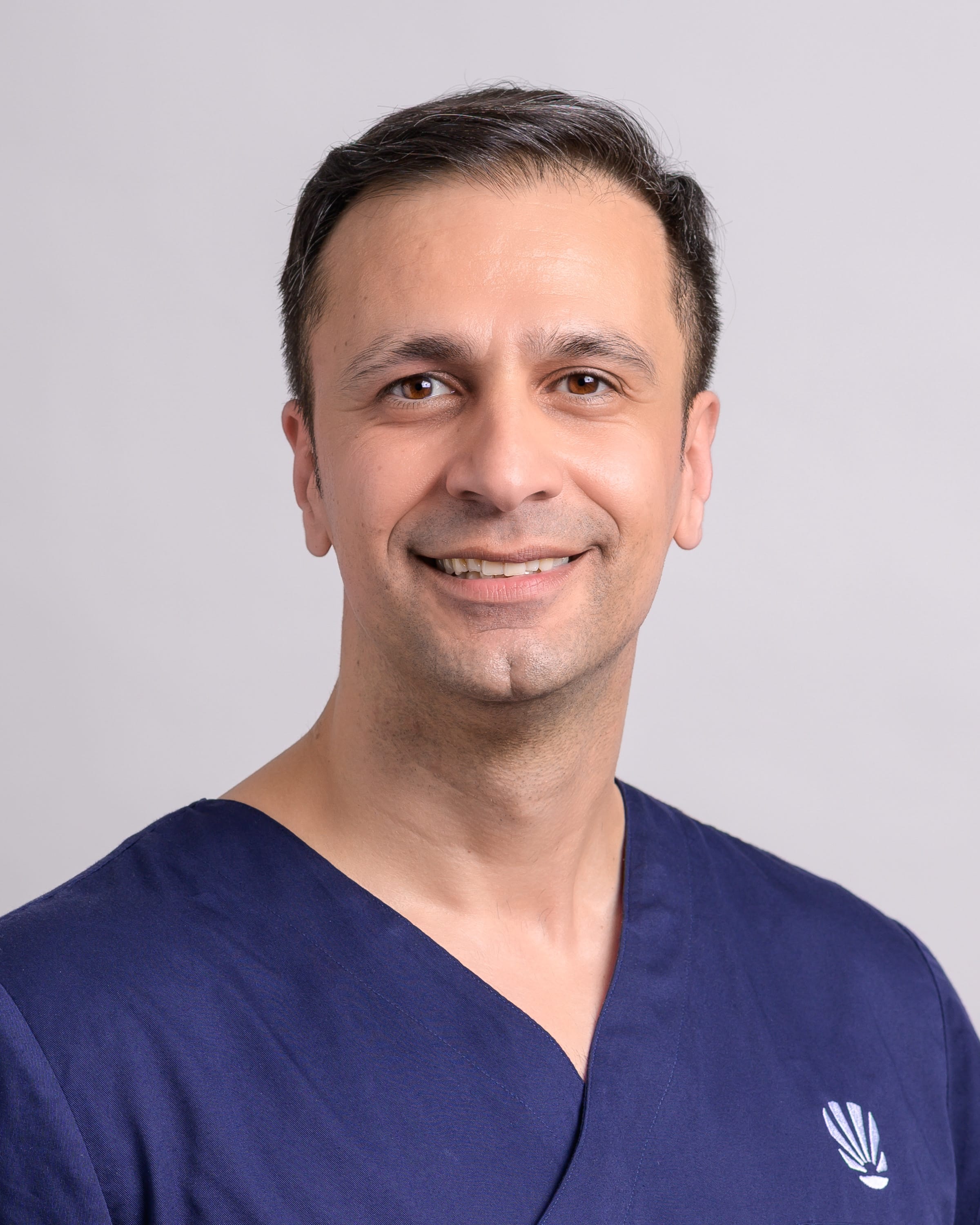 Zahnarzt Dr. med. dent. Mehdi Fereidouni bei Königsweiß Zahnärzte in Nürnberg
